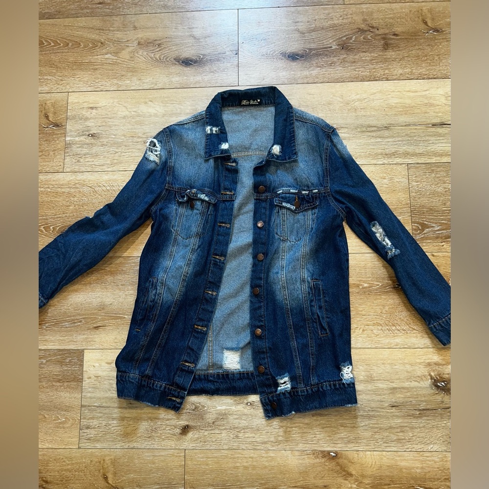 Women’s blue jean jacket destroyed style large